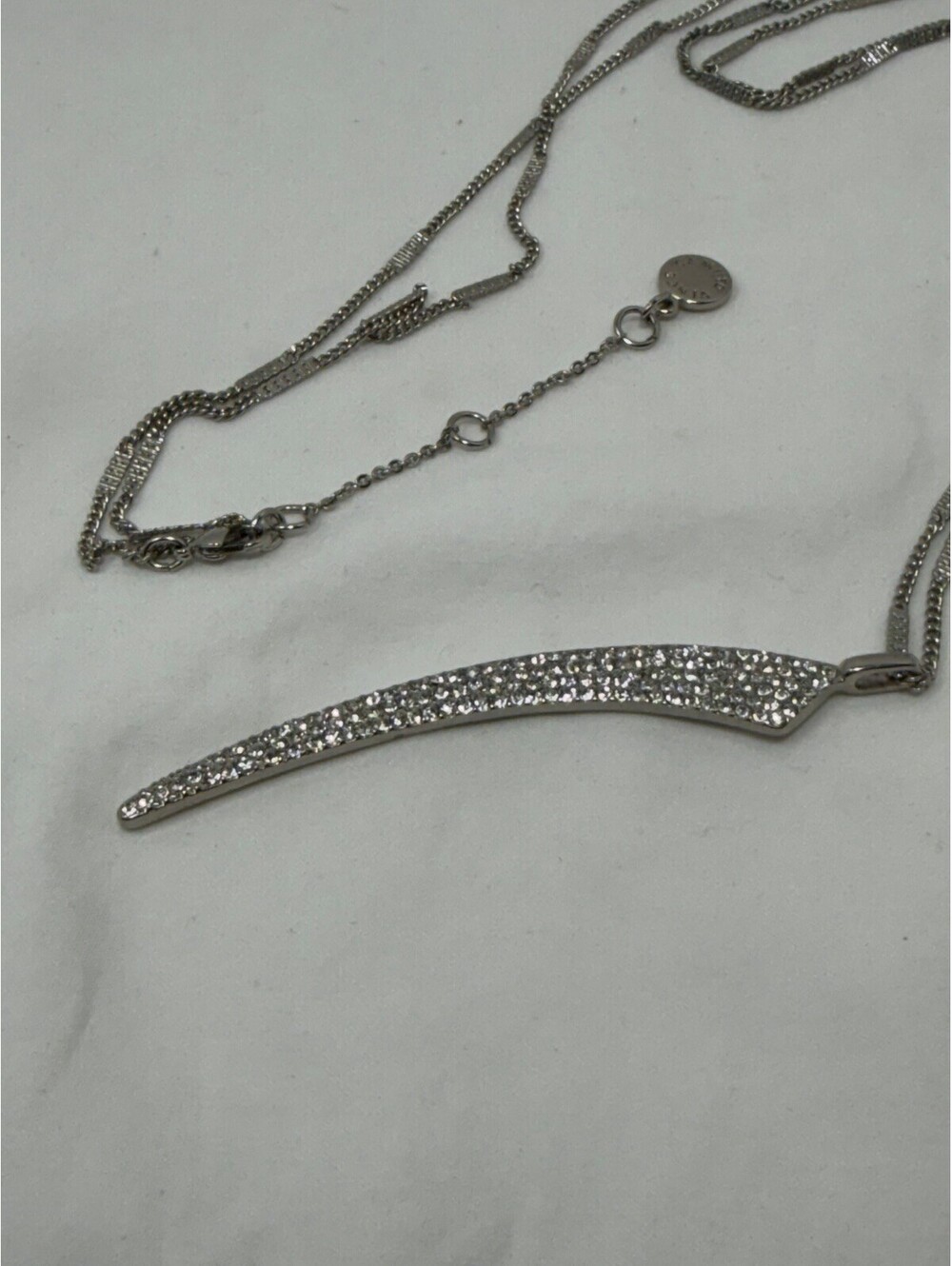 Vince Camuto Silver Tone Crystal Pavé Curved Horn Spike Pendant Necklace